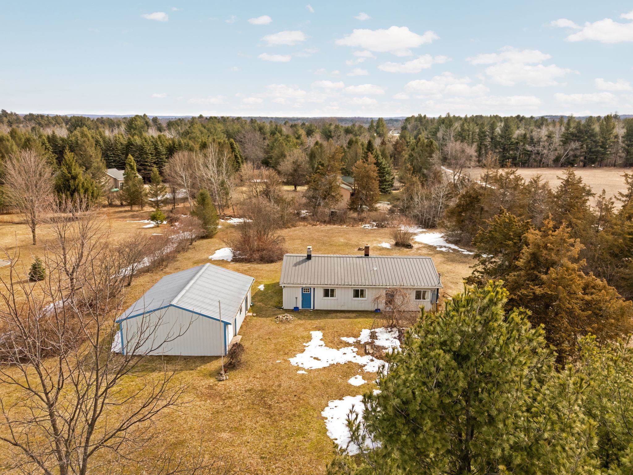 9125 Ayers Road Williamsburg, MI 49690 - Photo 1 of 31