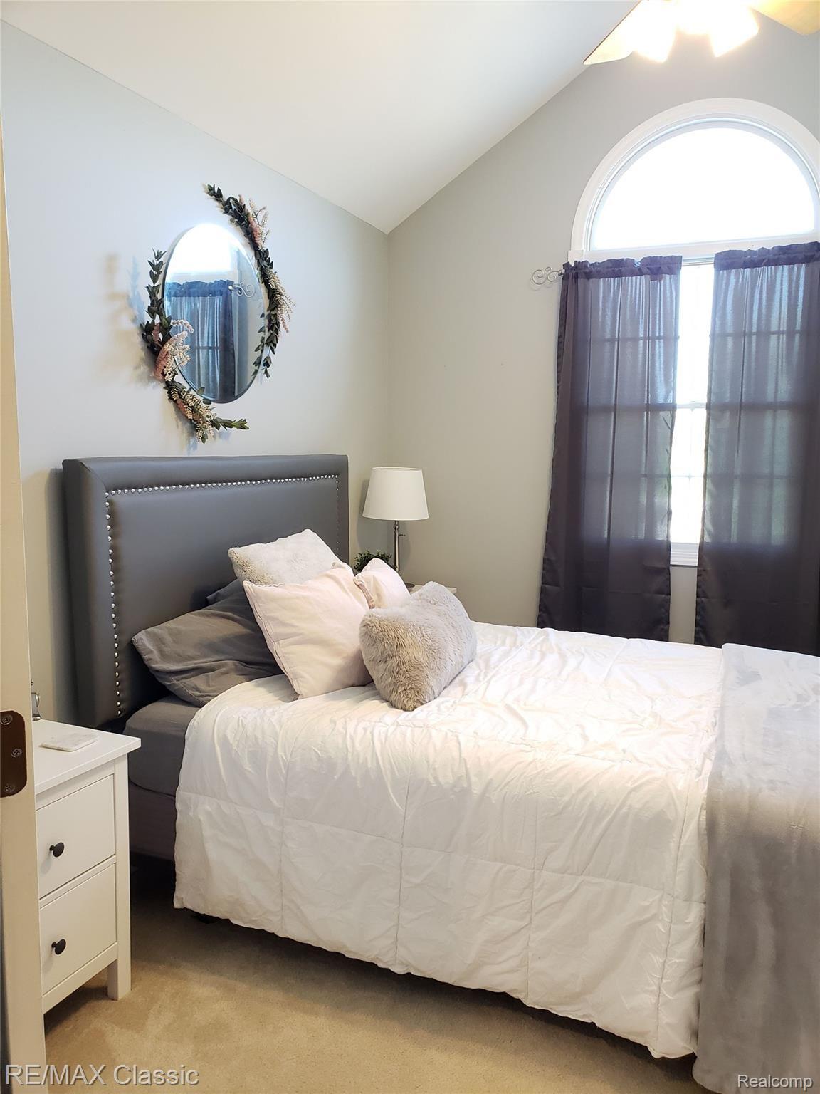 8070 Oak Grove Road Howell, MI 48855 - Photo 30 of 34 2nd bedroom Beautiful room with cathedral ceiling and large closet.