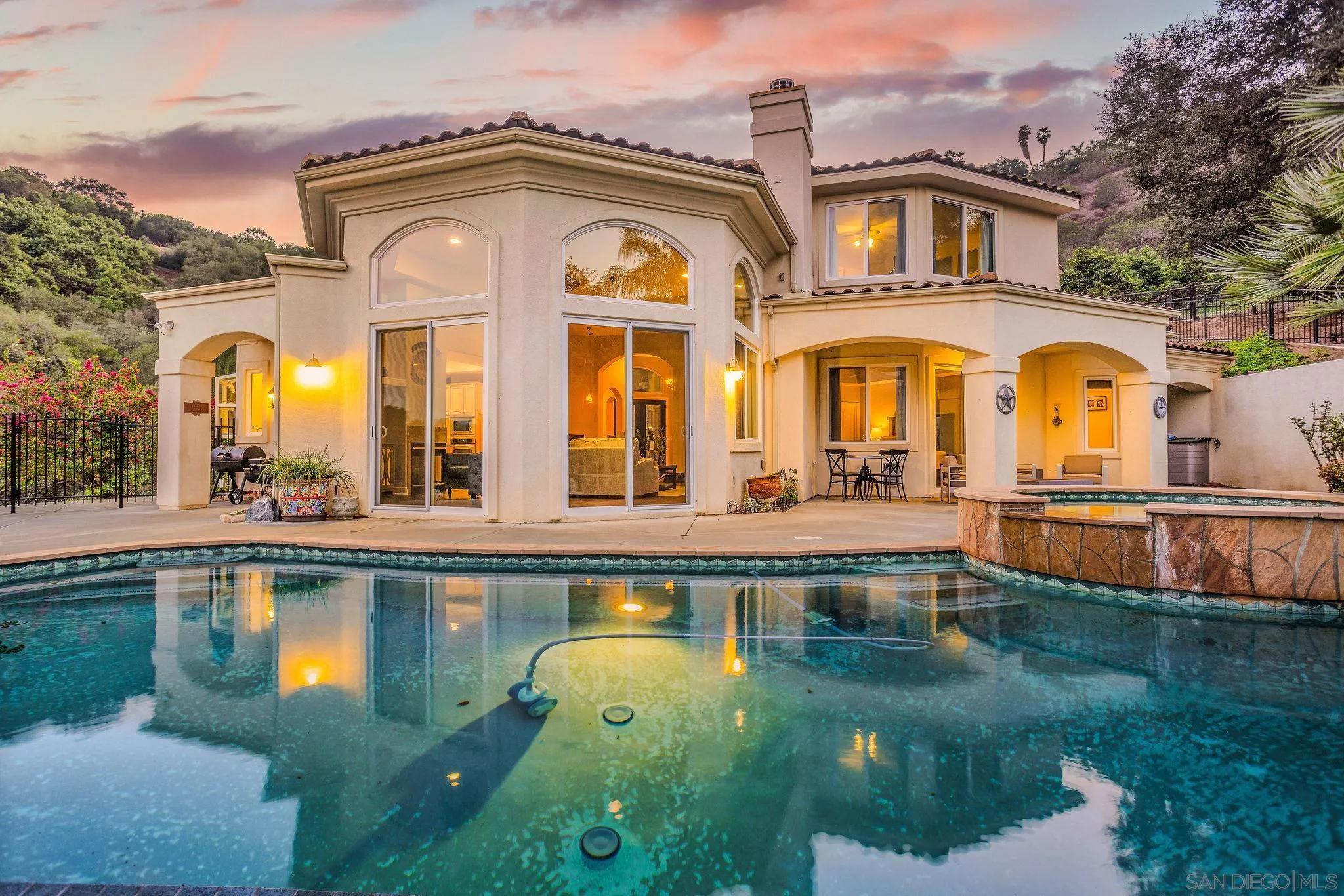 4003 Millagra Drive Fallbrook, CA 92028 - Photo 1 of 46 a front view of a house with swimming pool