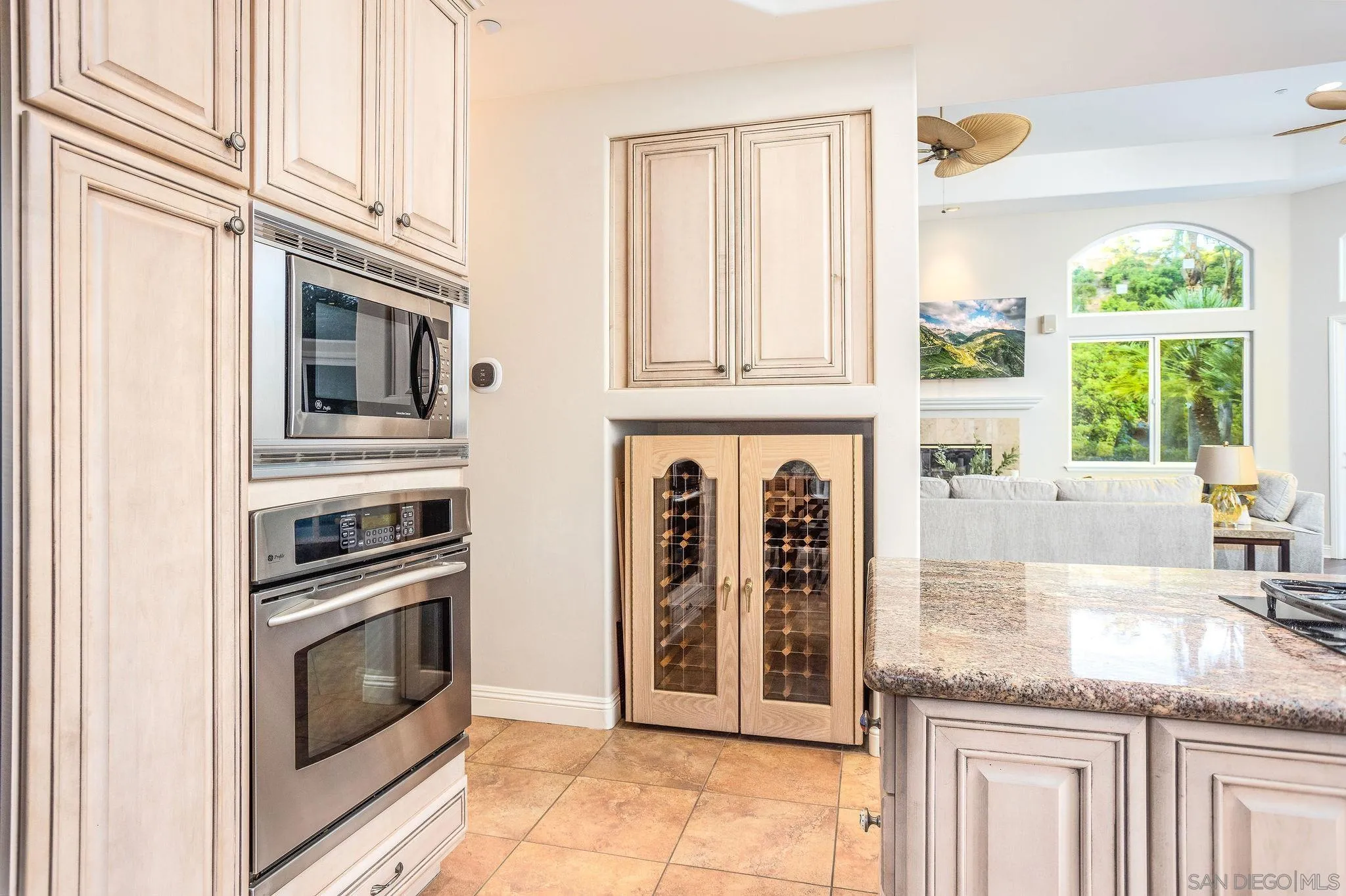 4003 Millagra Drive Fallbrook, CA 92028 - Photo 11 of 46 a kitchen with stainless steel appliances granite countertop a stove microwave and a sink