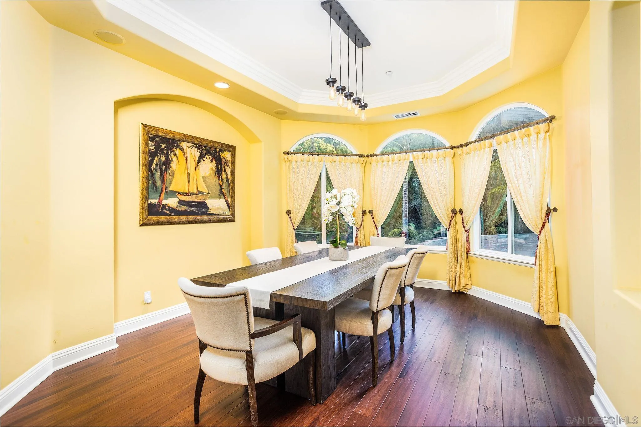 4003 Millagra Drive Fallbrook, CA 92028 - Photo 12 of 46 a view of a dining room with furniture and wooden floor