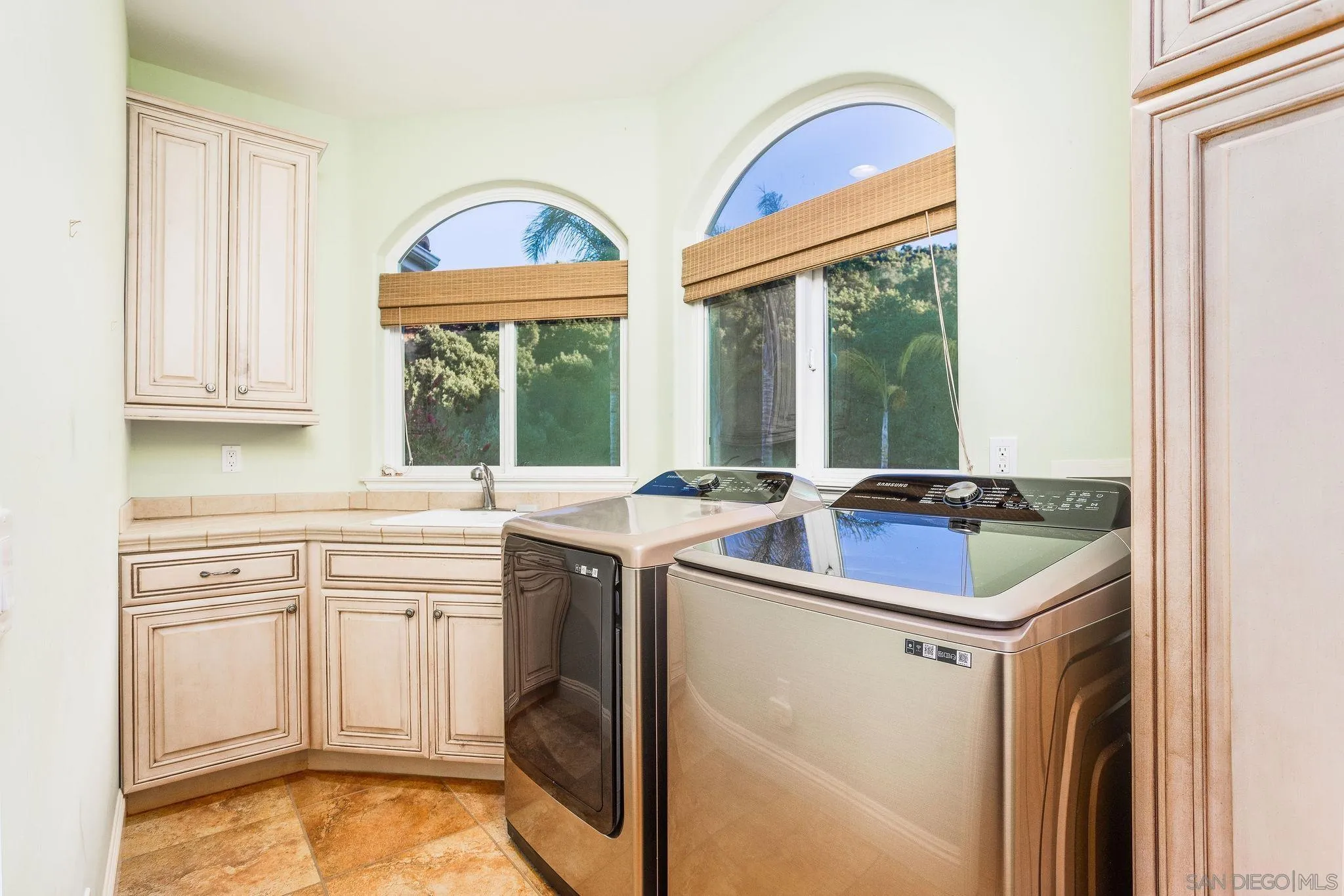 4003 Millagra Drive Fallbrook, CA 92028 - Photo 14 of 46 a view of a kitchen with a sink and a stove top oven