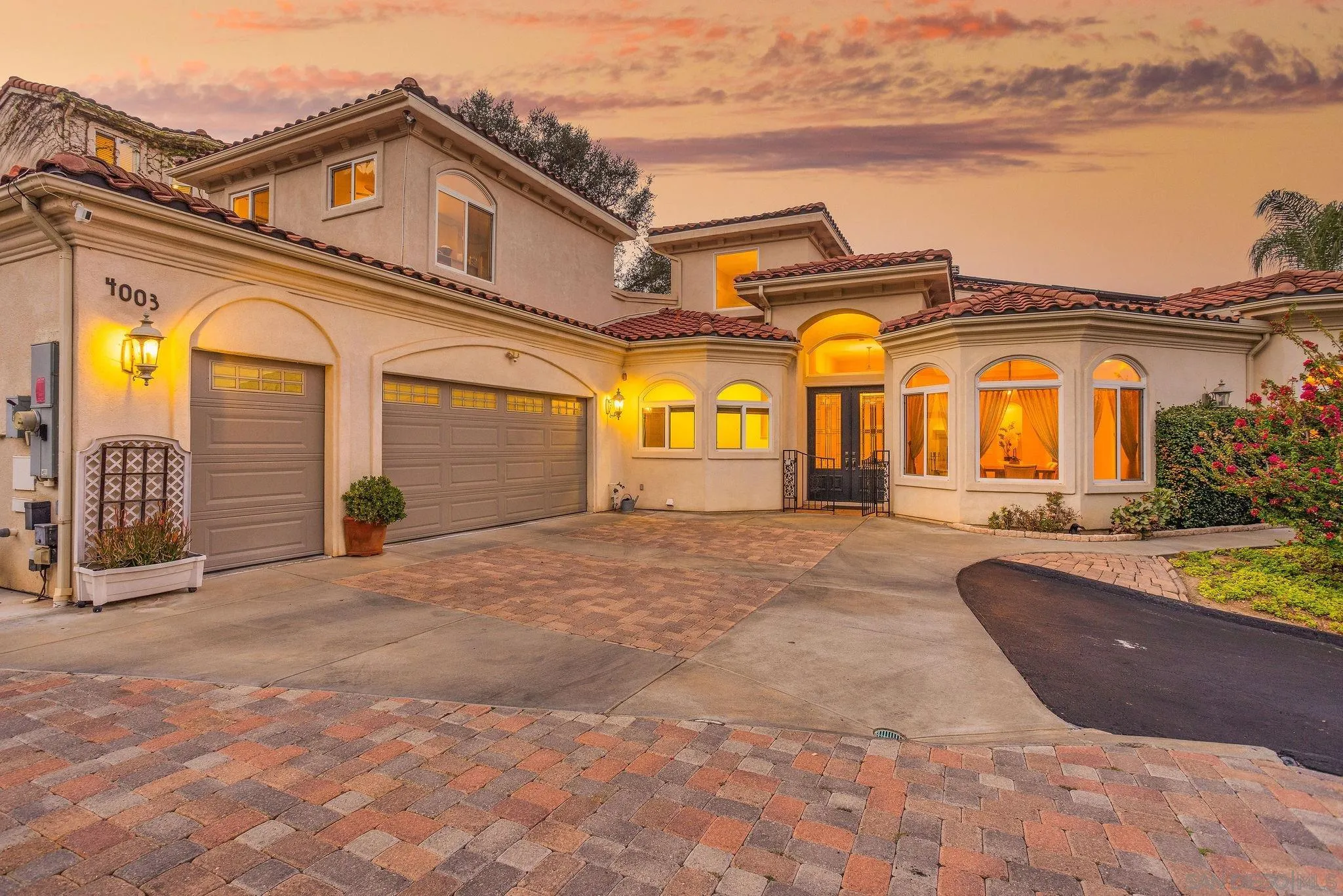 4003 Millagra Drive Fallbrook, CA 92028 - Photo 2 of 46 a front view of a house with a yard and seating space