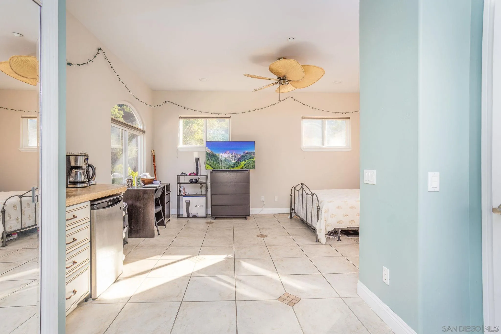4003 Millagra Drive Fallbrook, CA 92028 - Photo 38 of 46 a kitchen with stainless steel appliances kitchen island granite countertop a refrigerator and a sink