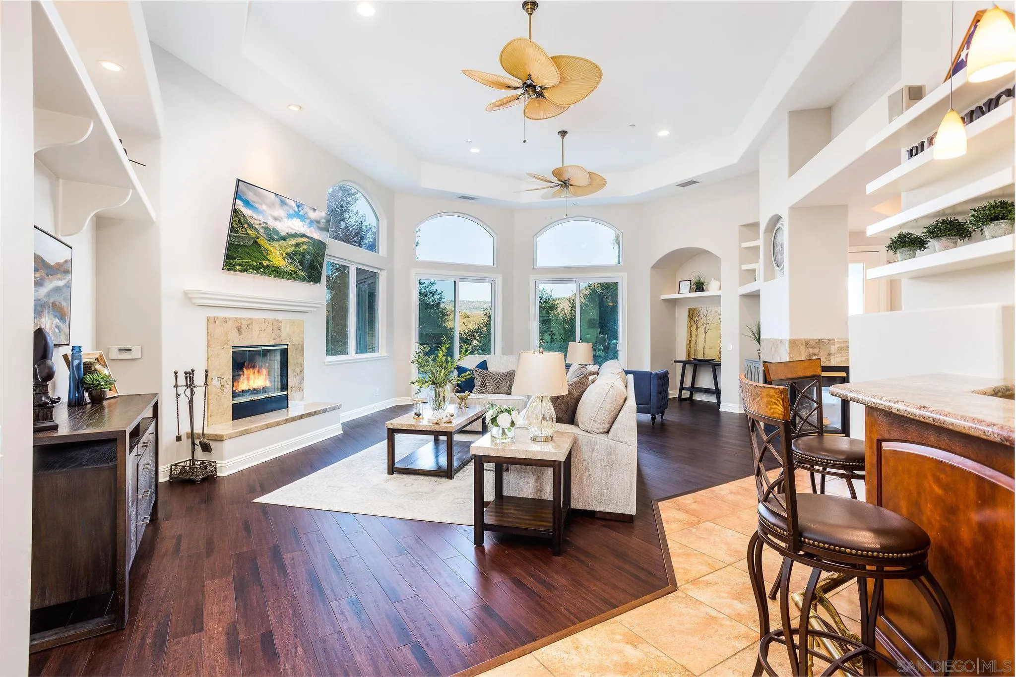 4003 Millagra Drive Fallbrook, CA 92028 - Photo 4 of 46 a living room with fireplace furniture and a wooden floor