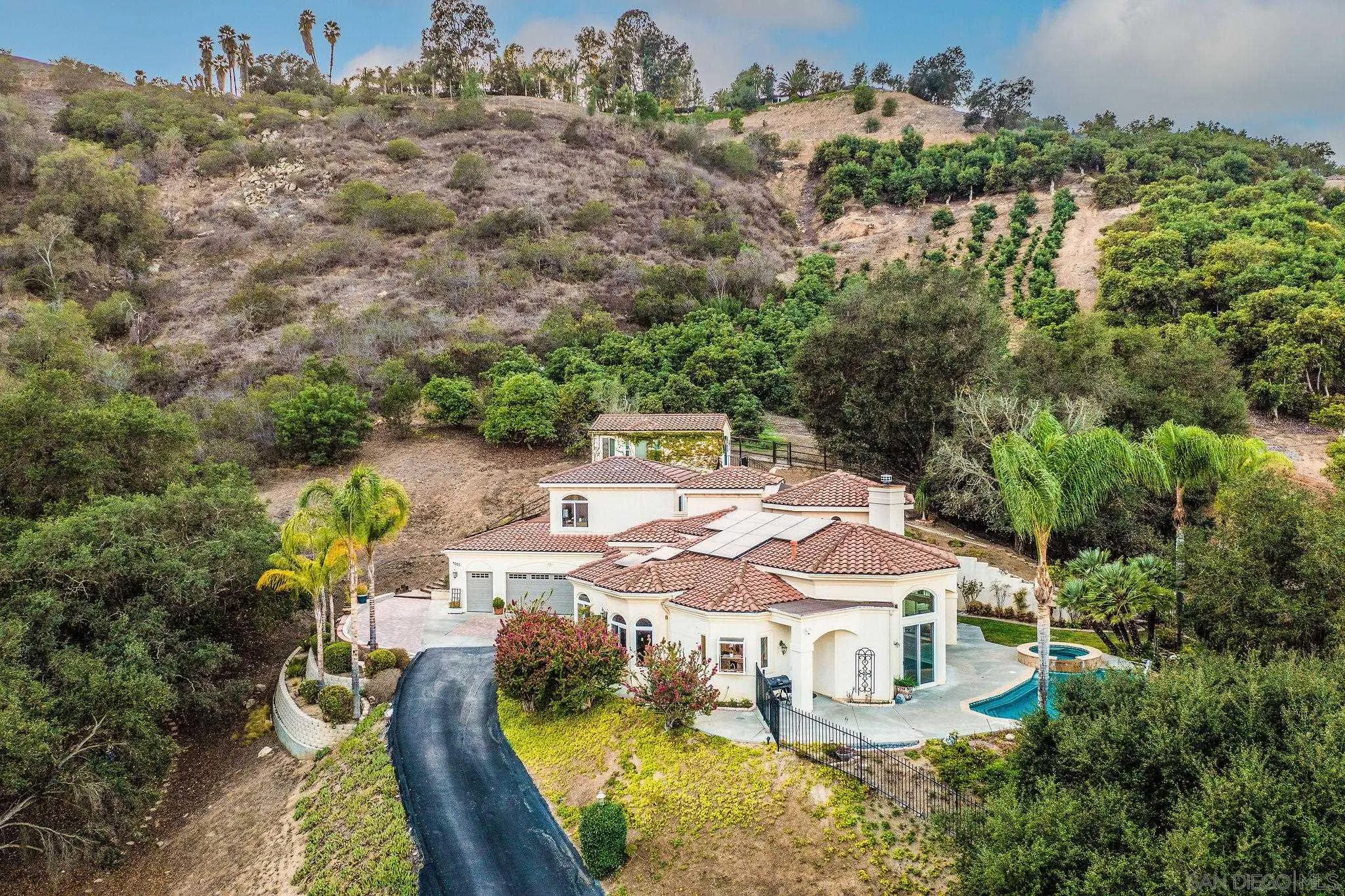4003 Millagra Drive Fallbrook, CA 92028 - Photo 46 of 46 a view of a house with pool and chairs