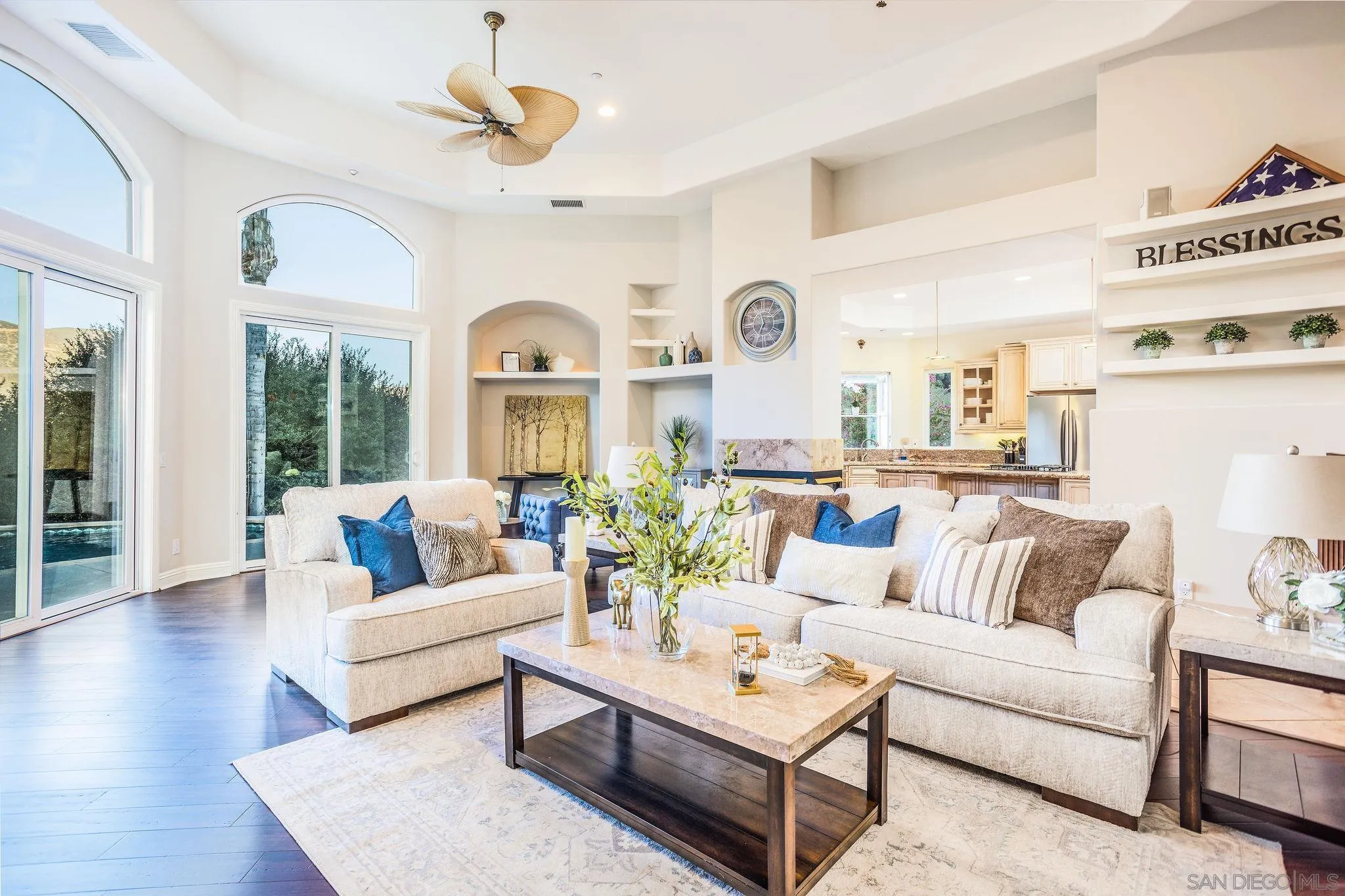 4003 Millagra Drive Fallbrook, CA 92028 - Photo 6 of 46 a living room with furniture ceiling fan and a large window