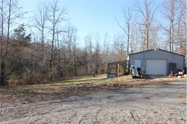 762 Glenn Baker Road Dickson, TN 37055 - Photo 19 of 20 24x36 metal garage/shop with electricity.