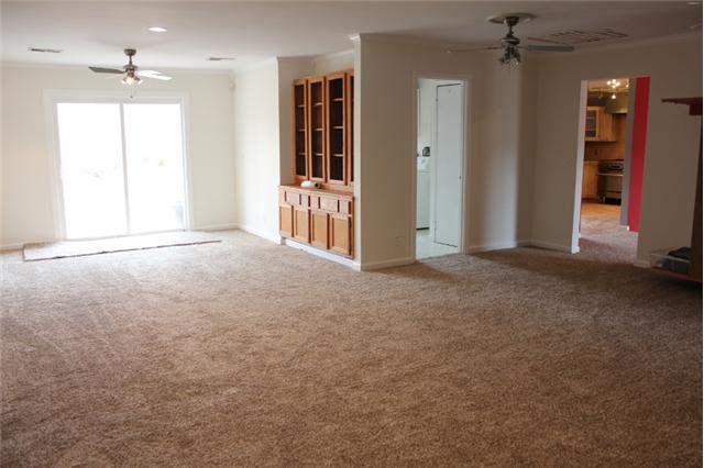 762 Glenn Baker Road Dickson, TN 37055 - Photo 9 of 20 Large L shaped room that could be used as a den/rec. room/ dining combo.