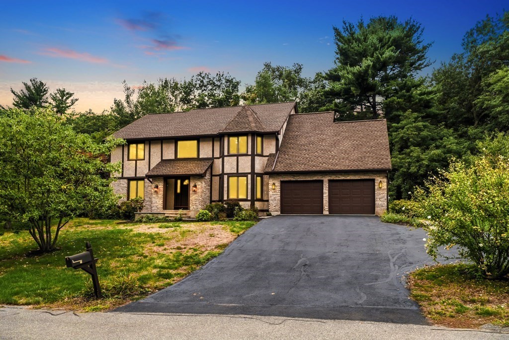 2 Braeburn Road Chelmsford, MA 01824 - Photo 1 of 7 front view of a house with a yard