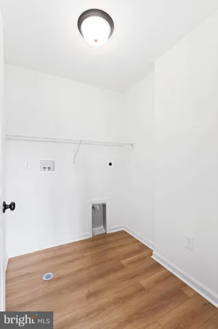 a view of a brick house with a yard