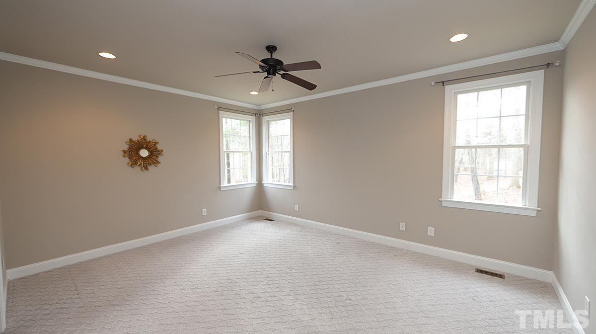152 Rivers Edge Court Timberlake, NC 27583 - Photo 40 of 41 a view of an empty room with a window
