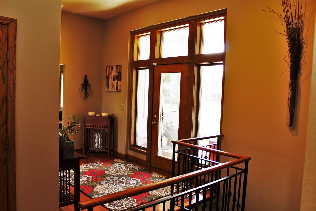 766 Timber Ridge Trail Rockford, IL 61114 - Photo 3 of 25 a view of a room with rack on the wall and a window