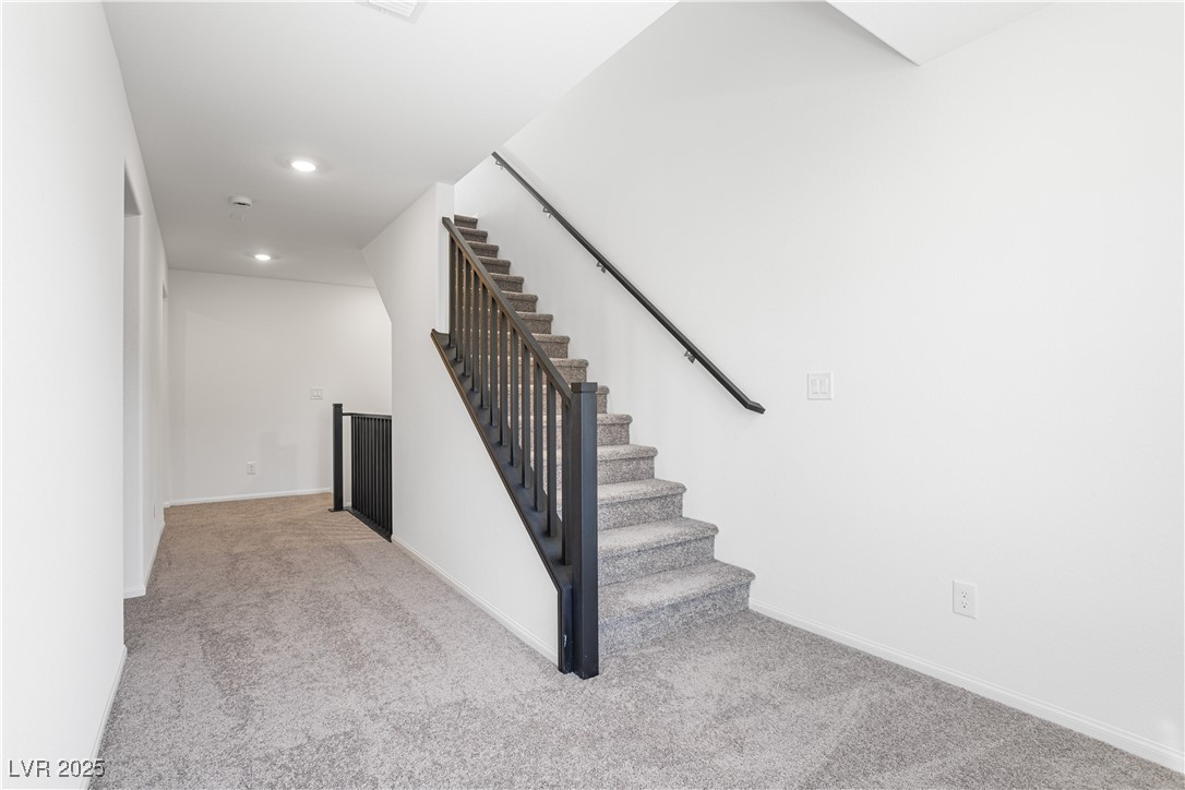5670 Spring Trellis Street Las Vegas, NV 89113 - Photo 10 of 23 Stairway featuring carpet flooring and recessed lighting