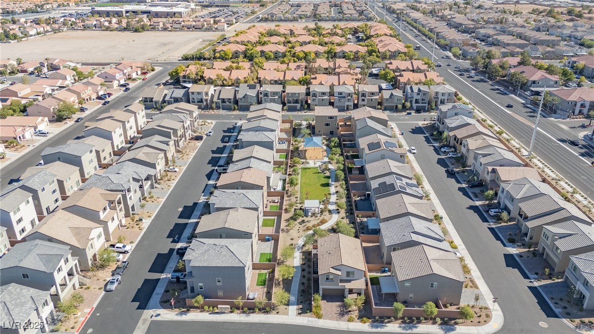 5670 Spring Trellis Street Las Vegas, NV 89113 - Photo 19 of 23 Aerial perspective of suburban area