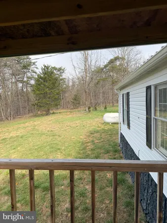 a view of a balcony with an outdoor space