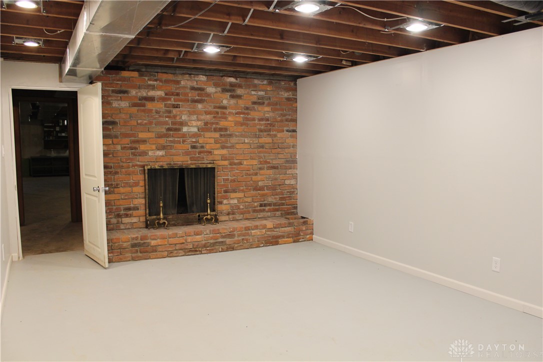 8390 Dog Leg Road Dayton, OH 45414 - Photo 46 of 61 WBFP in finished part of the lower level w/ canned lighting waiting for your finishing touches. Seller don't warrant the FP