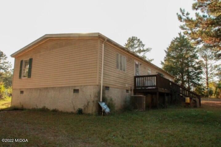 362 Chestnut Hill Road Fort Valley, GA 31030 - Photo 4 of 23 a view of a house with a yard