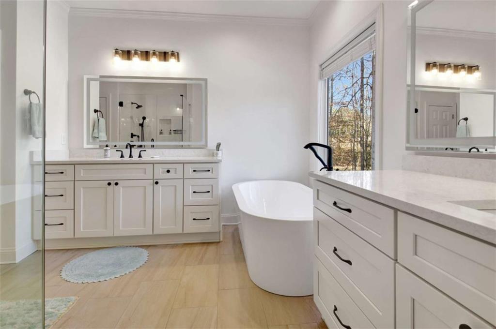 551 Lees Mill Road Fayetteville, GA 30214 - Photo 17 of 38 a bathroom with a granite countertop sink mirror and