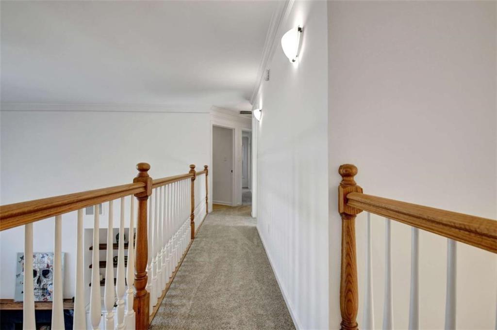 551 Lees Mill Road Fayetteville, GA 30214 - Photo 18 of 38 a view of a hallway with wooden floor