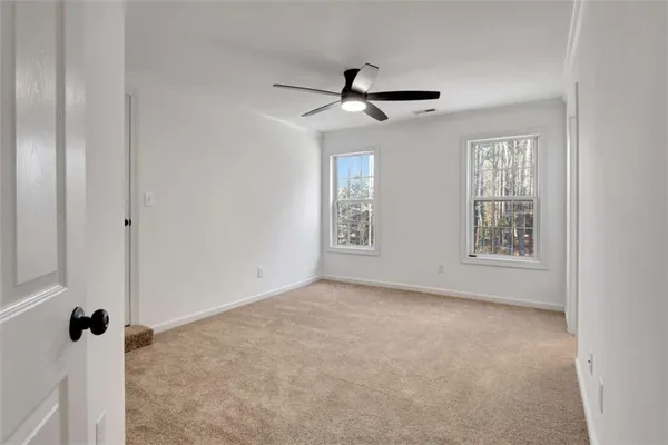 a bathroom with a sink vanity and mirror