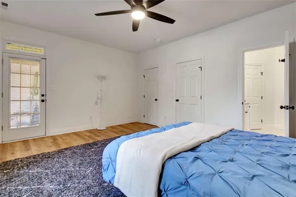 a bathroom with a shower sink and vanity
