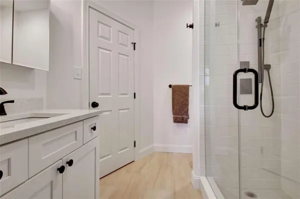 a view of a swimming pool with a patio and yard