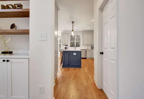 a bathroom with a sink and mirror