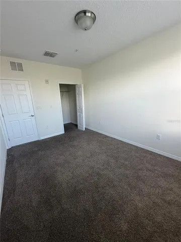 an empty room with a natural light