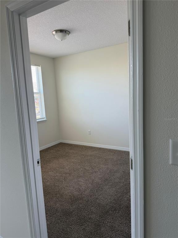 2121 McCoy Road, Unit 235 Orlando, FL 32809 - Photo 6 of 20 a view of a room that has a window in it