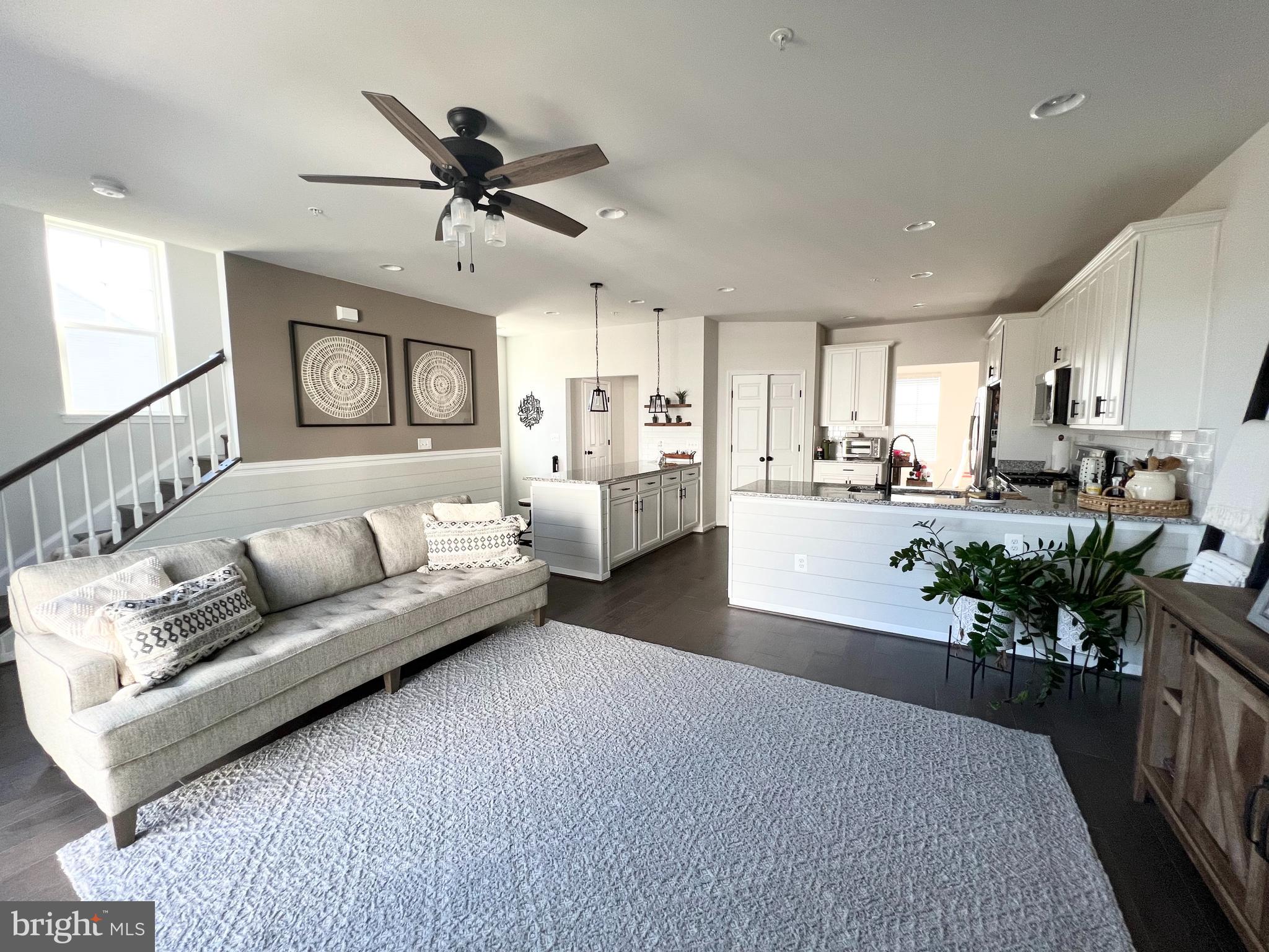 3501 Landing Way Silver Spring, MD 20906 - Photo 13 of 42 a living room with furniture and kitchen view