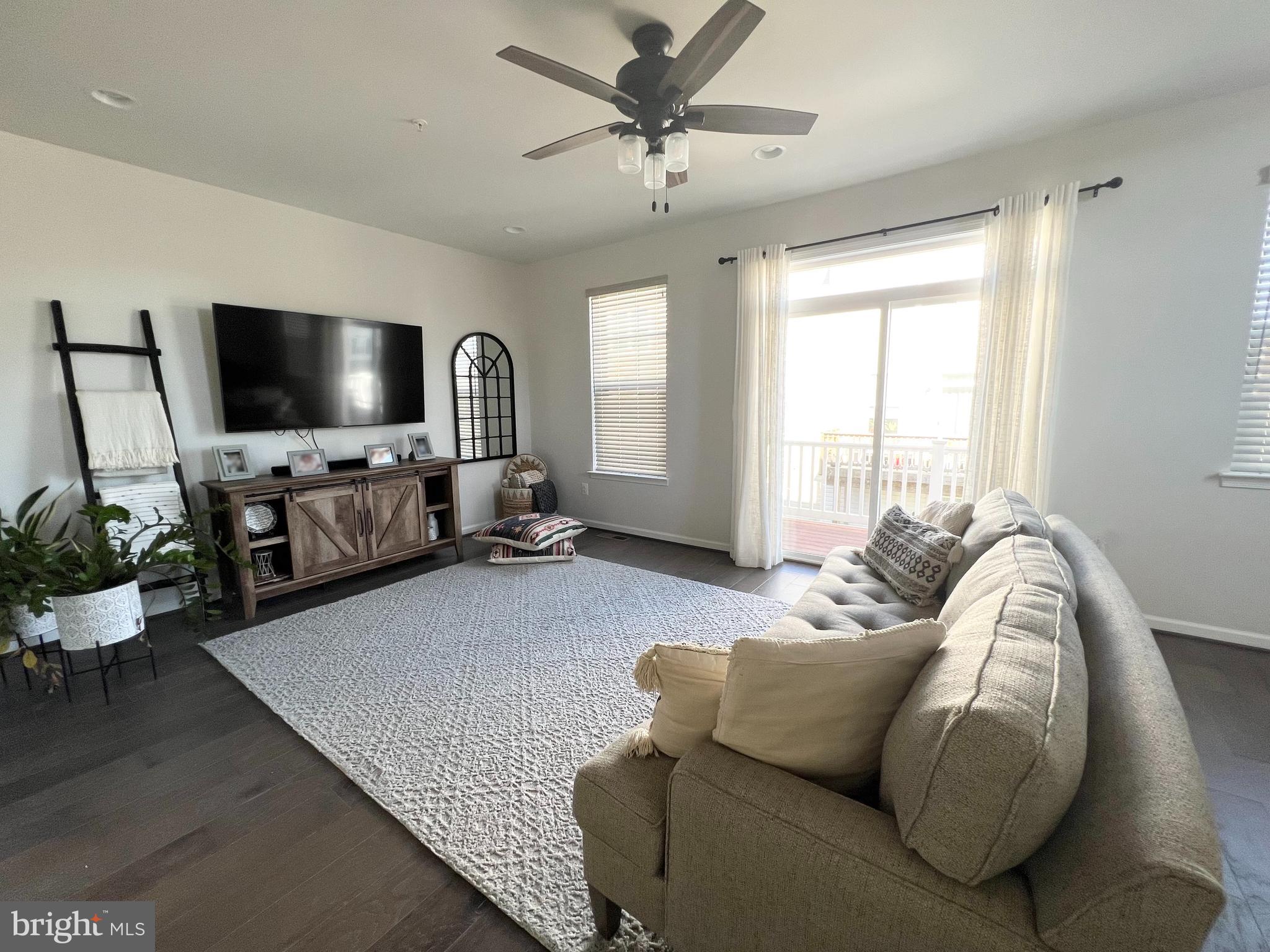 3501 Landing Way Silver Spring, MD 20906 - Photo 14 of 42 a living room with furniture and a flat screen tv