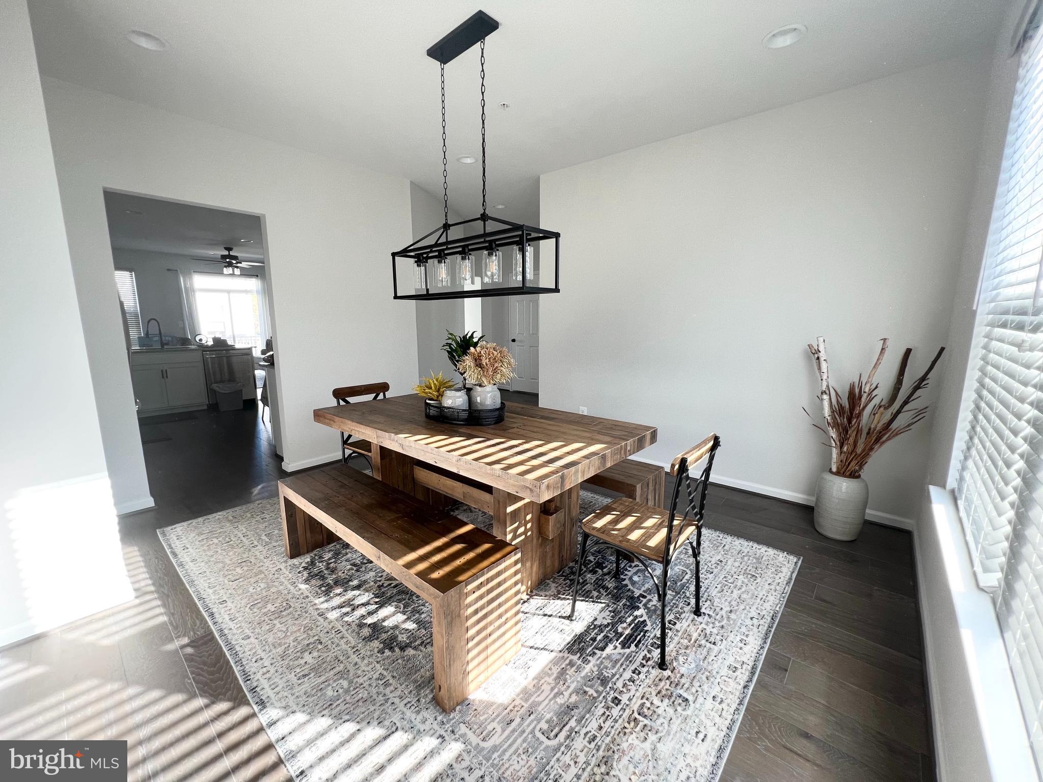 3501 Landing Way Silver Spring, MD 20906 - Photo 17 of 42 a living room with furniture and a chandelier