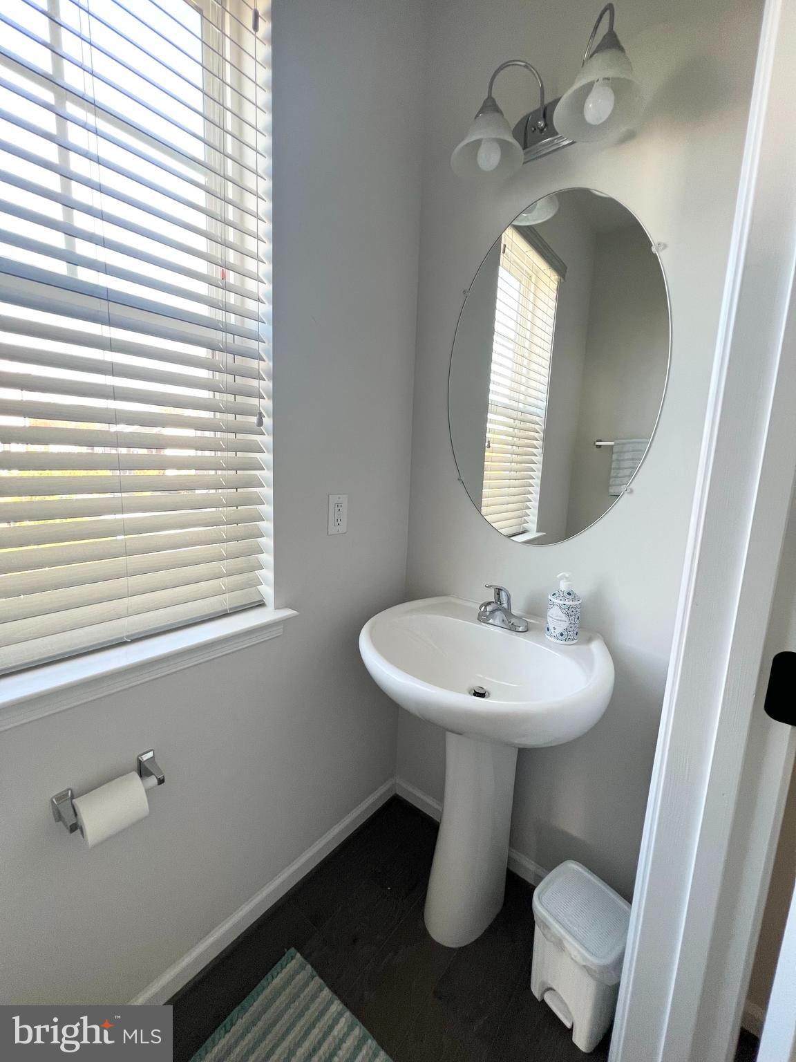 3501 Landing Way Silver Spring, MD 20906 - Photo 20 of 42 a bathroom with a toilet sink and mirror