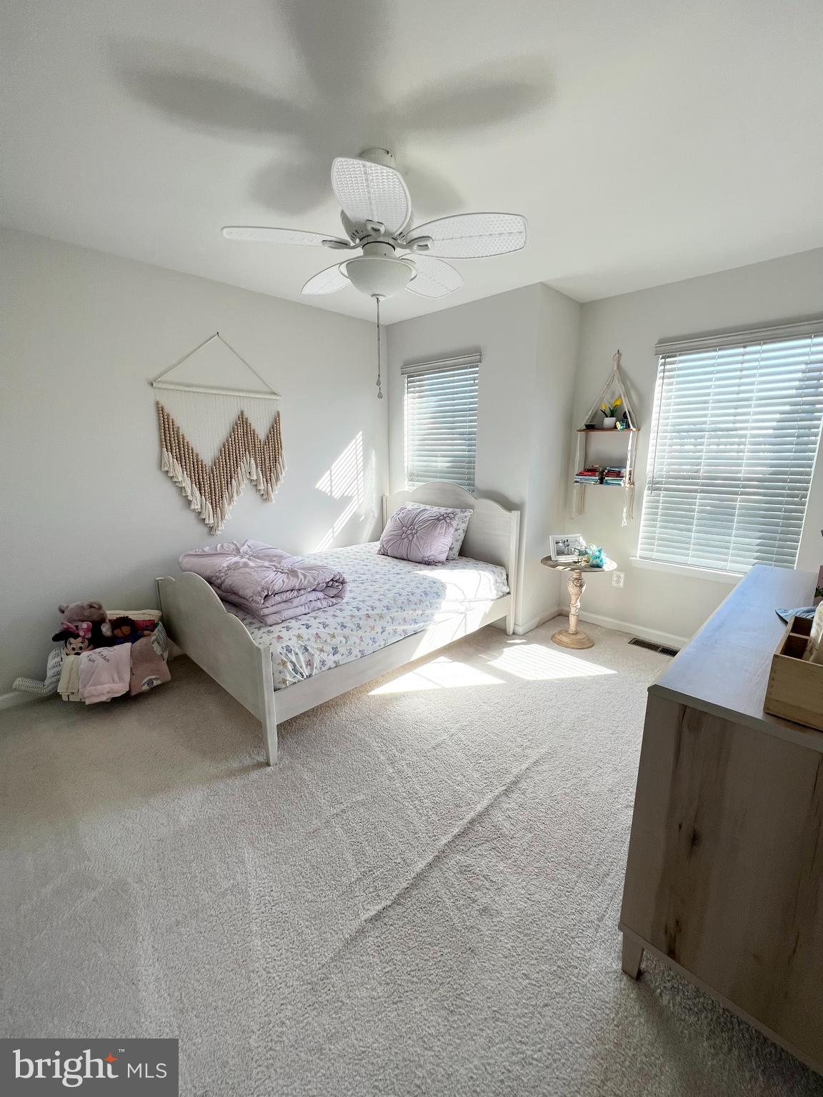 3501 Landing Way Silver Spring, MD 20906 - Photo 22 of 42 a bedroom with furniture and a chandelier
