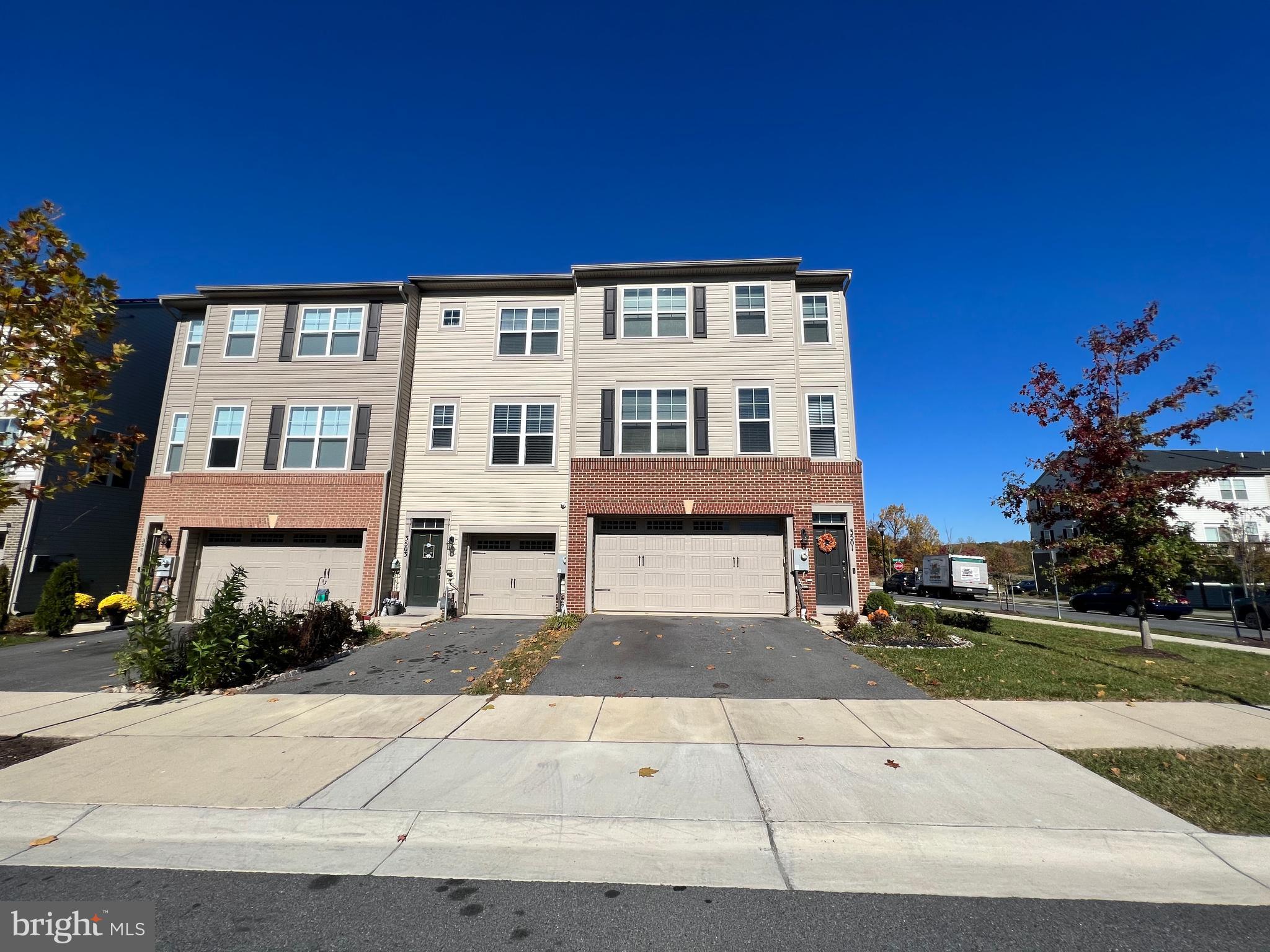 3501 Landing Way Silver Spring, MD 20906 - Photo 33 of 42 a front view of a house with a yard