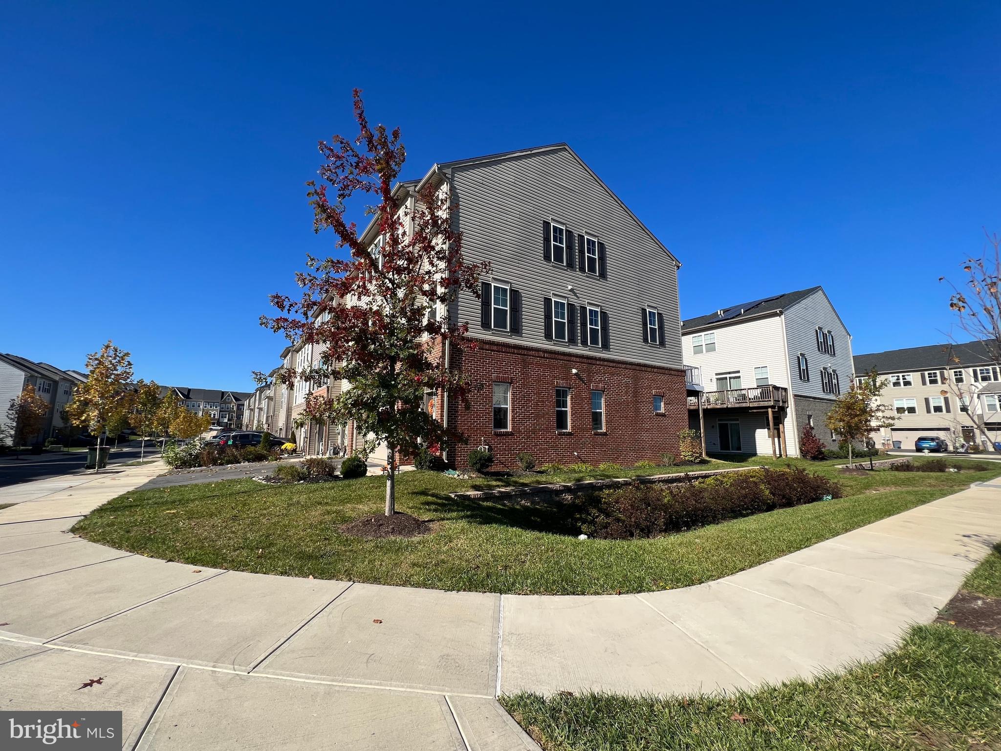3501 Landing Way Silver Spring, MD 20906 - Photo 35 of 42 a front view of a house with a yard