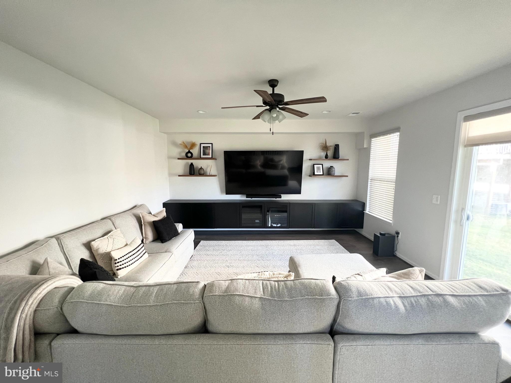 3501 Landing Way Silver Spring, MD 20906 - Photo 6 of 42 a living room with furniture and a fireplace