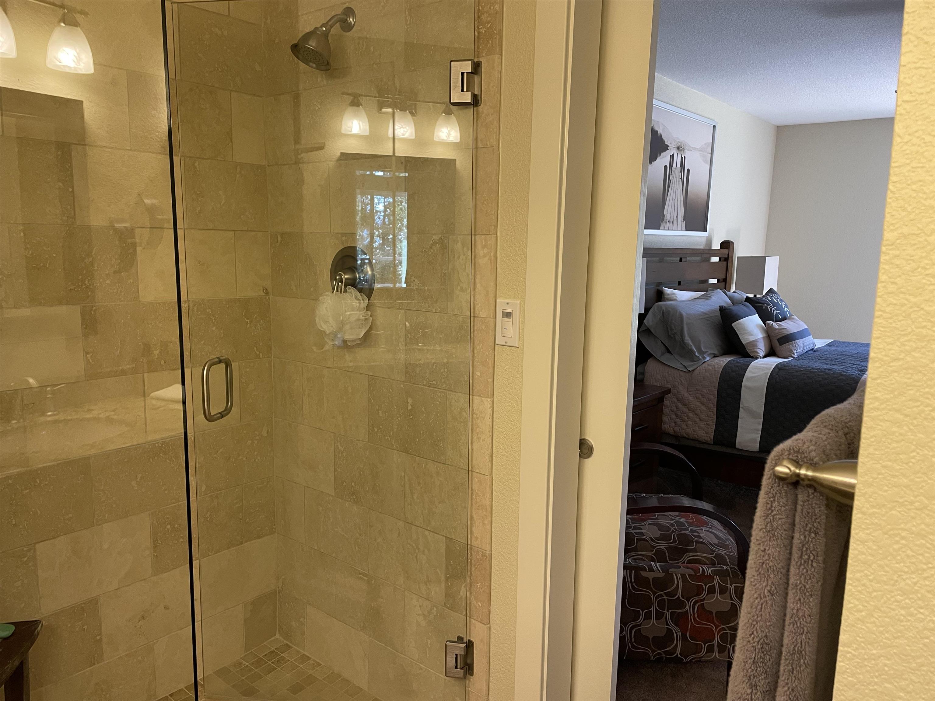 831 Timber Ridge Road Lake Almanor, CA 96137 - Photo 16 of 36 a en suite bathroom with a shower