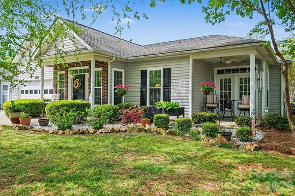 front view of a house with a yard
