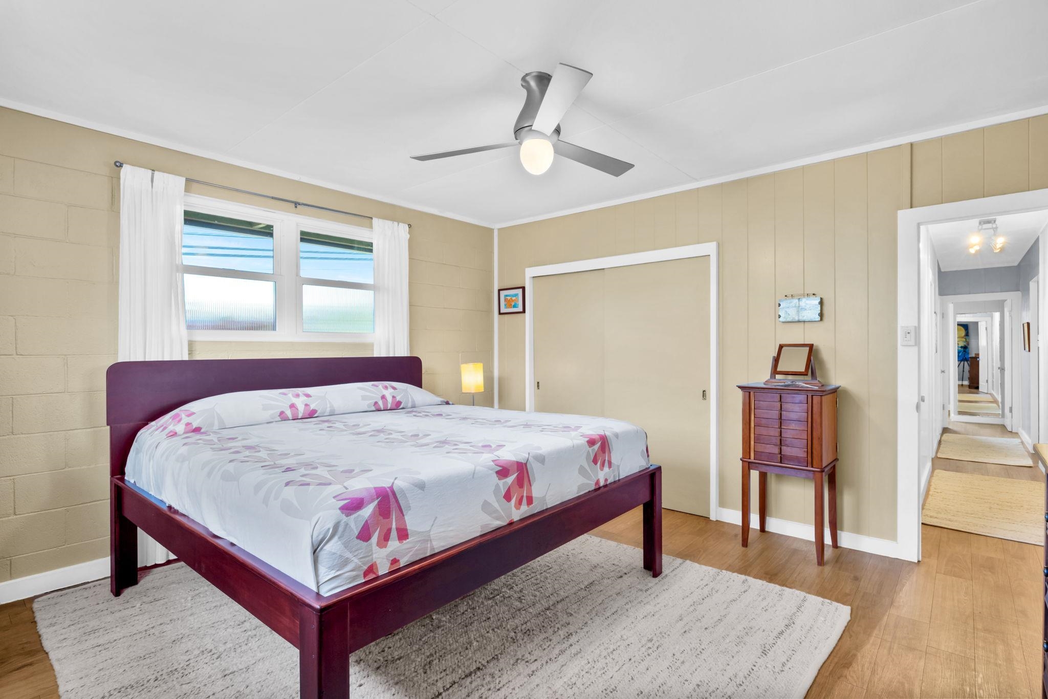 1199 Freitas Place Makawao, HI 96768 - Photo 17 of 49 a bedroom with a bed and a table in it