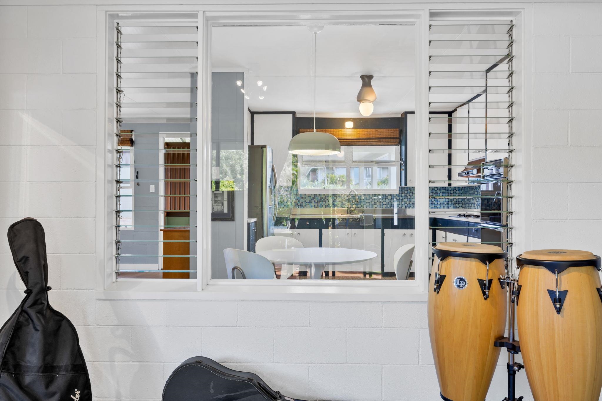1199 Freitas Place Makawao, HI 96768 - Photo 26 of 49 a living room filled with furniture and a window