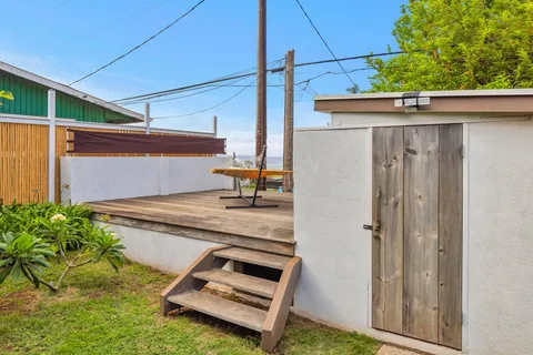 a view of swimming pool with a backyard