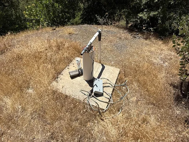 a view of swimming pool and lounge chair