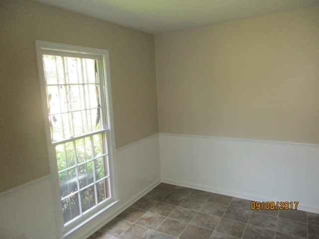 1742 Bunker Hill Road Columbus, GA 31907 - Photo 3 of 16 an empty room with a window