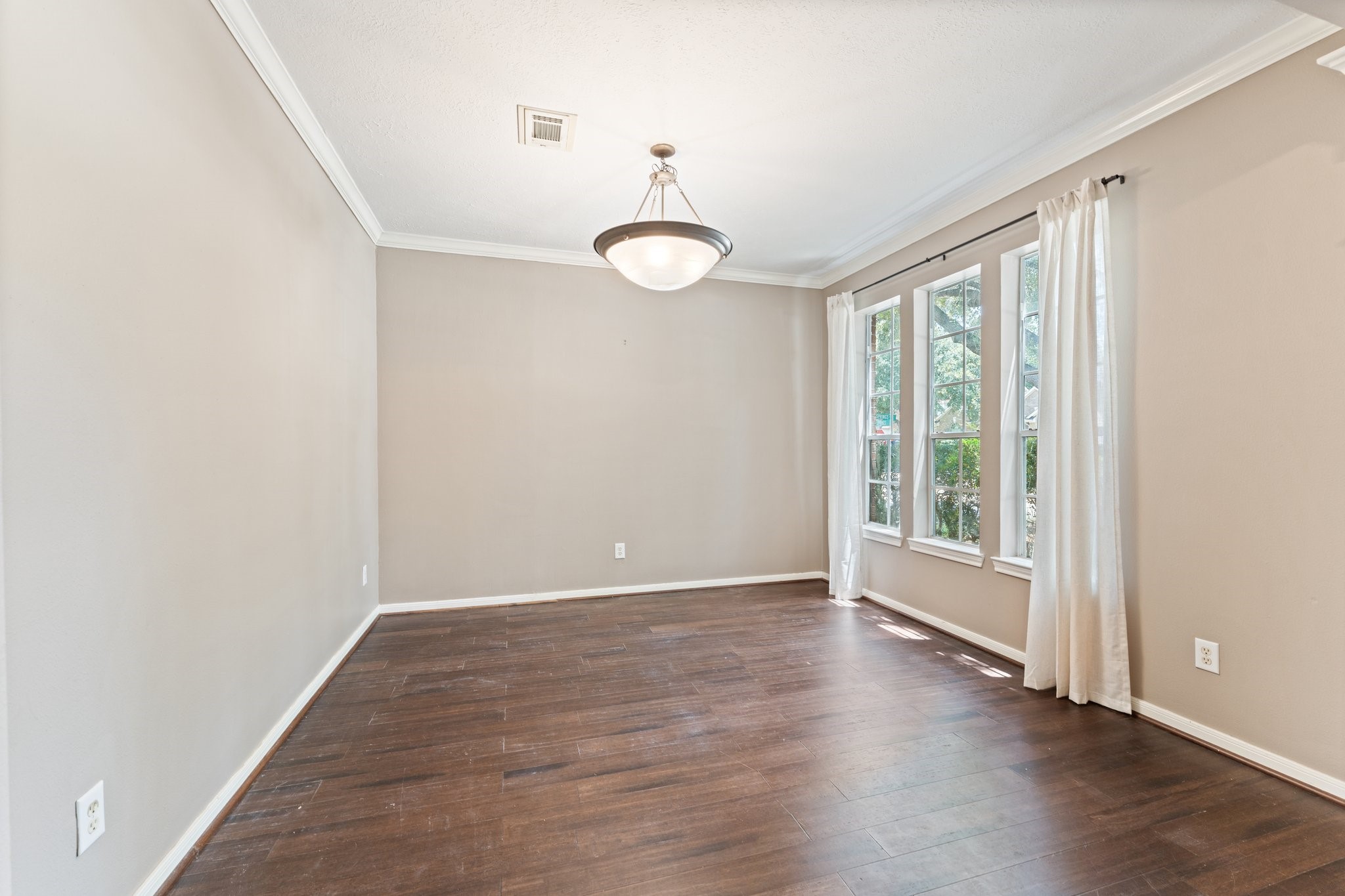 25447 China Springs Spring, TX 77373 - Photo 7 of 45 Bamboo floors in the dining area add rich color and warmth.