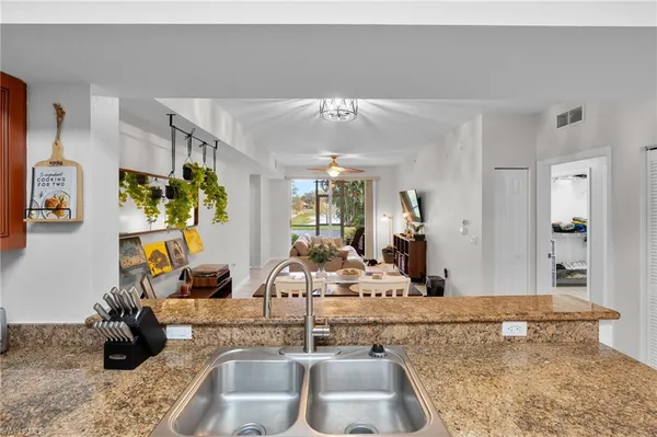 a view of a living room and bathroom