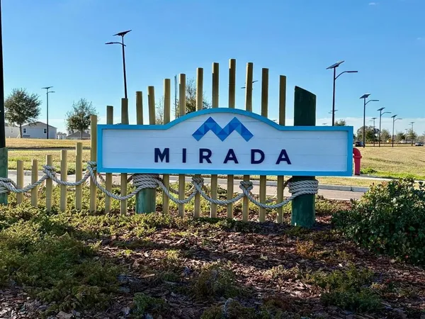 a sign that is on the side of the road