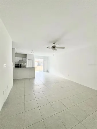 a view of a kitchen with a dishwasher and a stove top oven