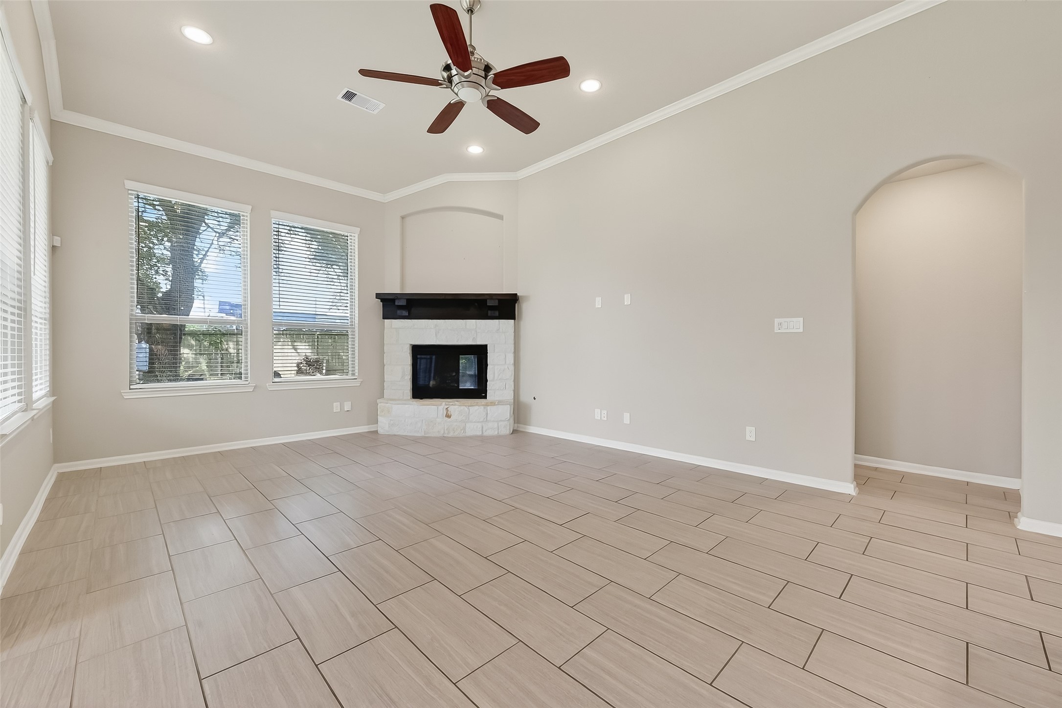 4718 Verbena Valley Way Spring, TX 77388 - Photo 12 of 24 an empty room with windows and fireplace